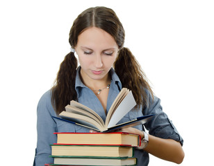 The beautiful girl with books isolated on white