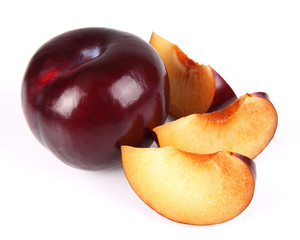 Fototapeta na wymiar Ripe plum with slices