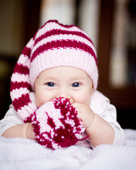 cute baby in a hat with pompom - 37582467