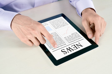Touching Screen With News On Tablet PC