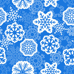 Blue seamless christmas background with snowflakes