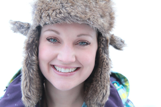 Beautiful Woman Outside In Trapper Hat