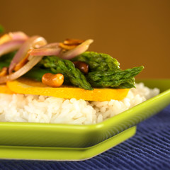 Green asparagus Thai-style served on rice