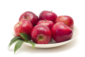red apples on a plate