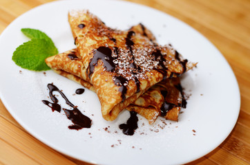 Crepes with chocolate sauce
