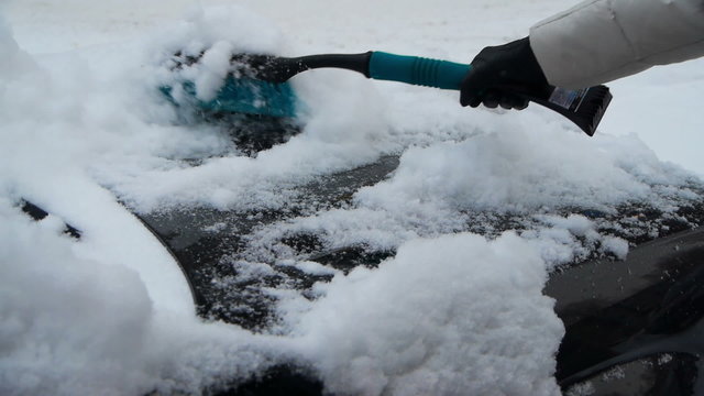 Removing snow from the car