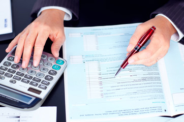 Business woman working with documents.