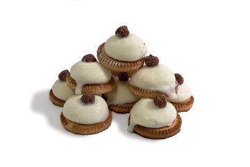 cookies covered with a spherical shape with white chocolate