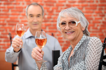 Senior couple celebrating anniversary in a restaurant