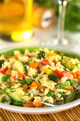 Vegetable risotto made of zucchini, pea, carrot, broccoli