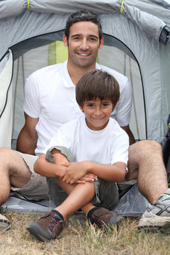 Father And Son Camping Together