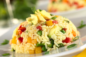 Vegetable risotto with scrambled egg on top