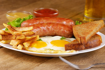 Fried eggs with sausages