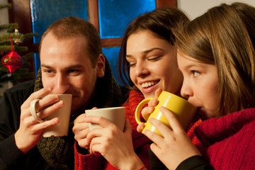 young man and woman celebrating christmas