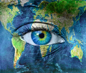 Planet earth and blue hman eye