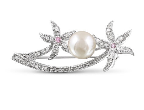 Silver brooch with pearl isolated