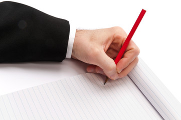 Mano che scrive con la matita