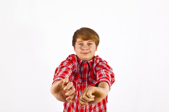 friendly looking young boy with red shirt