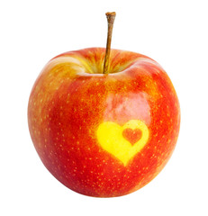 red apple with a heart-shaped ornament isolated on white