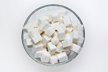 Many white pieces of sugar