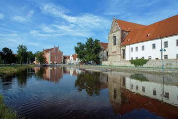 Naklejka na ściany i meble River behind the Church in Ceske Budejovice