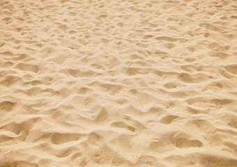 Plakat tekstury żółtym piasku na plaży