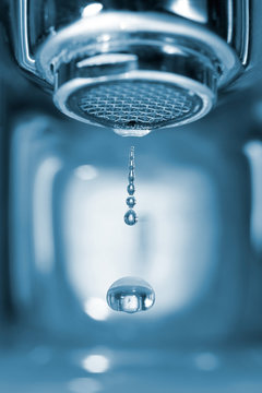 Water drop from a faucet