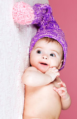 beautiful baby in knitted cap