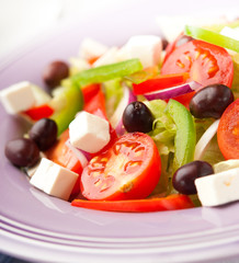 Vegetable salad with feta cheese and olives