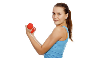 Sporty woman with red barbells on white background