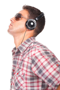 man listening music  with headphones on