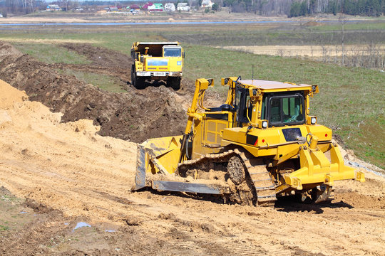 bulldozer and truck work