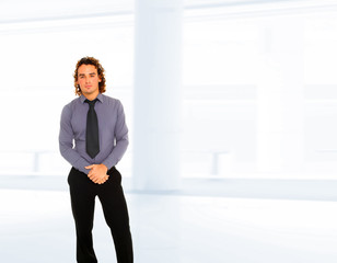 Business man standing in office