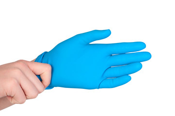 Man wears rubber glove on his hand.