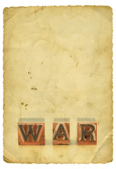 Word "war" on old paper background