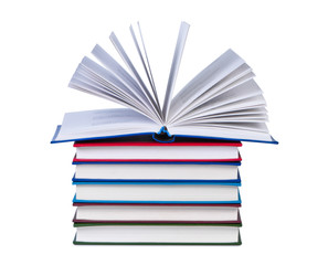 Open book on stack of books isolated.