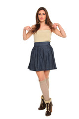 Beautiful young woman wearing a blue skirt