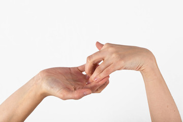 A womans hand is shown in yoga gesture