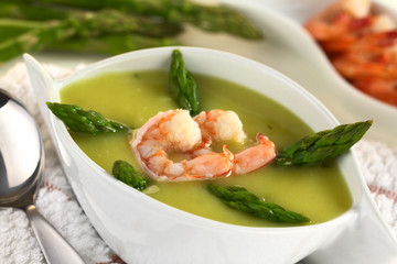 Cream of green asparagus with shrimp (Selective Focus)