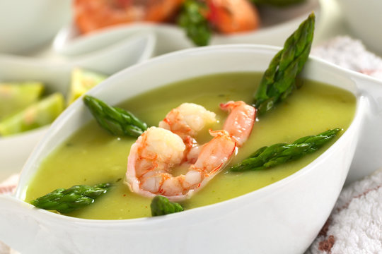 Cream of asparagus with shrimps (Selective Focus)