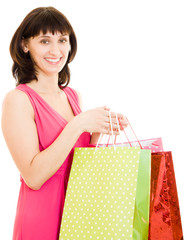 Girl with shopping in the red dress on white background.