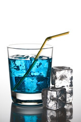 Blue cocktail with ice cubes