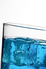 Blue cocktail with ice cubes