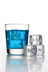 Blue cocktail with ice cubes