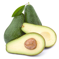 Avocado cut in half isolated on white
