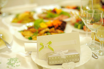 accent of empty invitation card and gift box