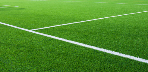 Naklejka premium Football field fragment with white lines
