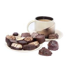 coffee and chocolate candies isolated on white background