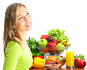 Young woman with fruits and vegetables.