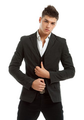 Young man posing in studio dressed in a business suit